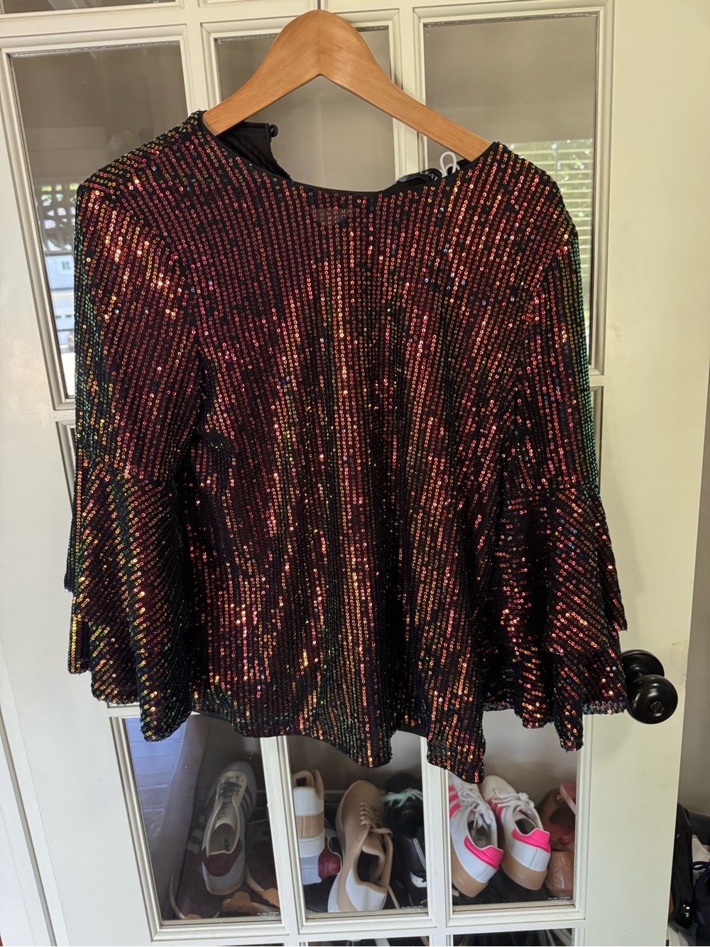 NWT women’s size small full sequin loose fitting size small top